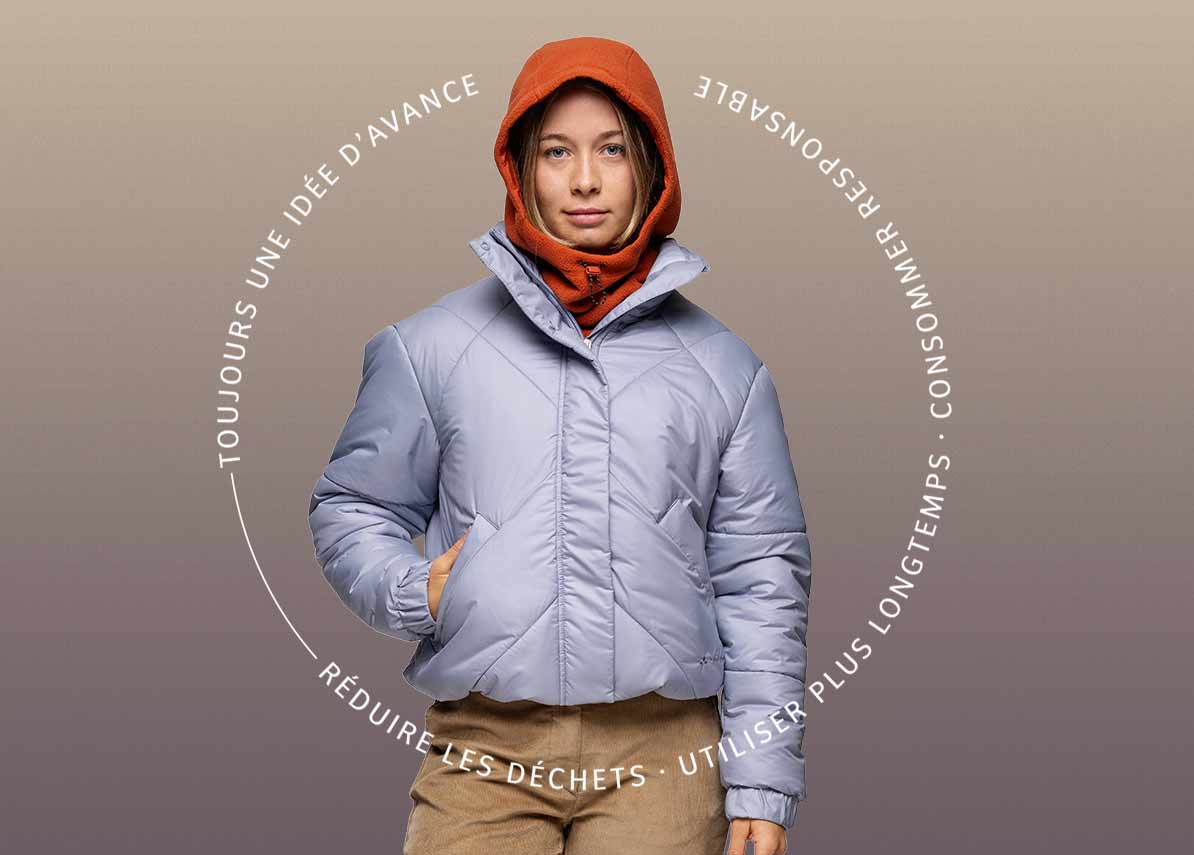 Jeune femme v&ecirc;tue d'une tenue d'hiver tendance